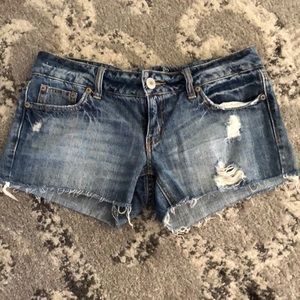 Distressed AE jean shorts
